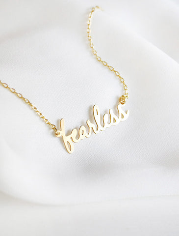 gold fearless necklace