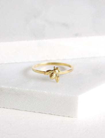 initial ring . gold