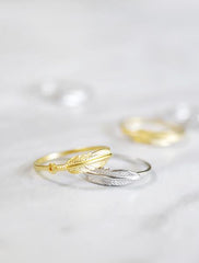 feather rings . set of 2