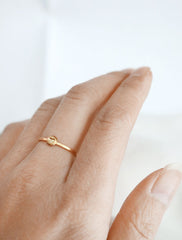 tiny heart stacking ring worn