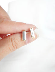 baguette crystal stud earrings held