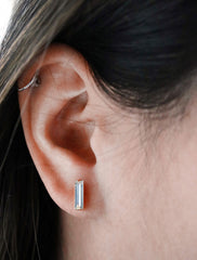 clear baguette crystal studs, modelled on the ear