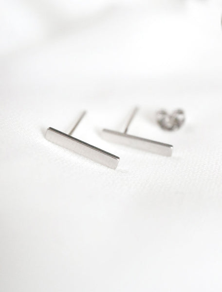 silver bar studs, side view