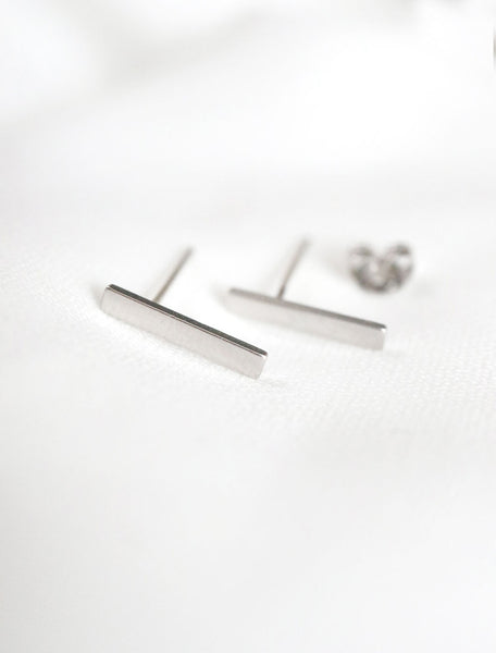 silver bar studs, side view