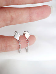 chained diamond earrings