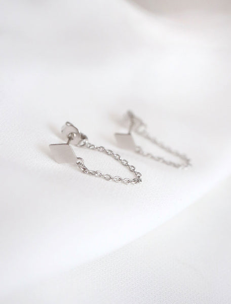 chained diamond earrings