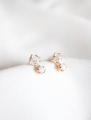 crystal and opal stud earrings close up