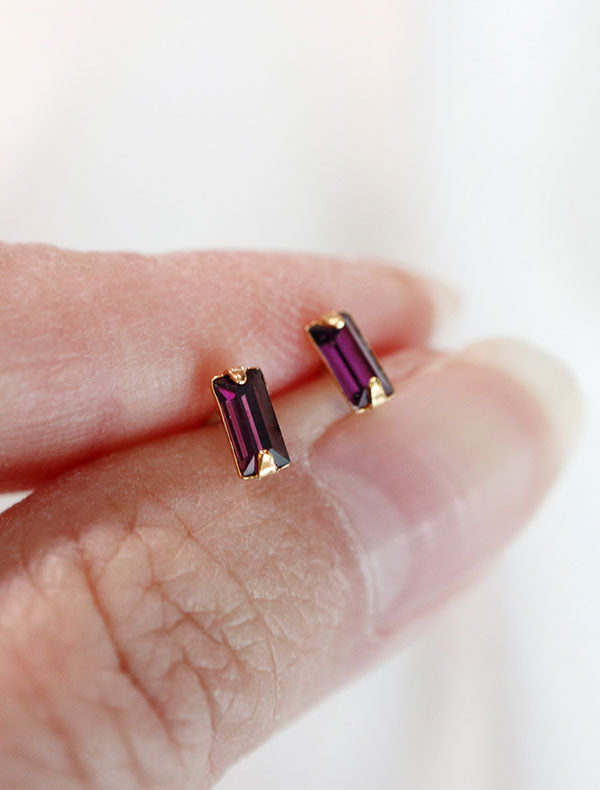 micro amethyst baguette stud earrings in hand, february birthstone