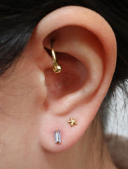 micro alexandrite baguette earrings modelled, june birthstone