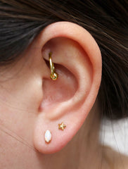 micro marquis opal stud earrings modelled