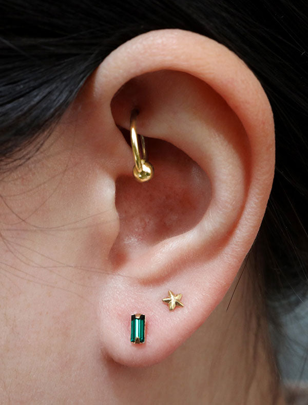 micro emerald baguette studs modelled, may birthstone