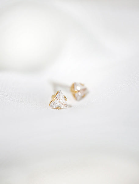 tiny gold triangle crystal studs side view
