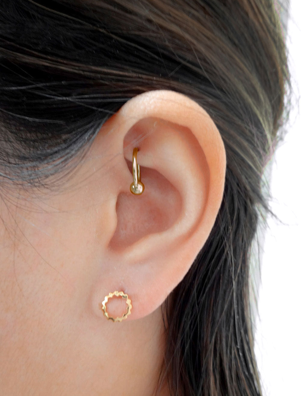 gold scalloped hoop stud earrings modelled