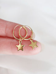 gold vermeil star charm hoops in hand