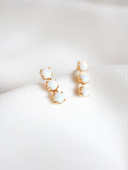 triple opal bar stud earrings side view