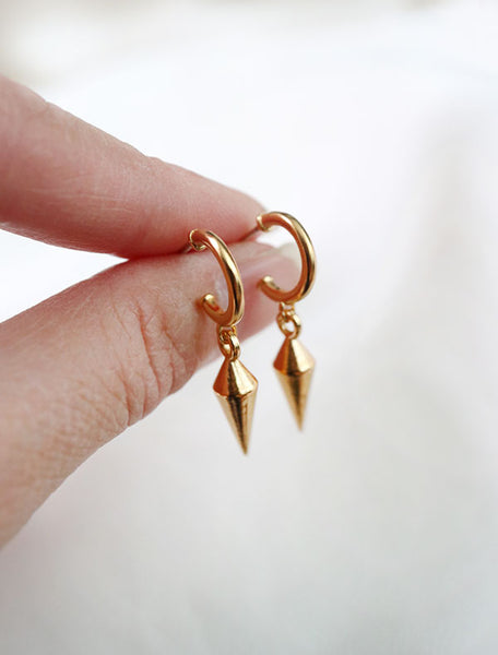 gold vermeil spike drop earrings in hand