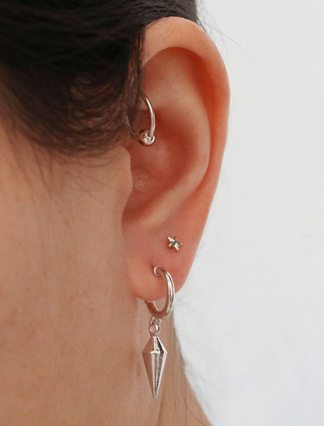 silver spike charm hoop stud earrings modelled