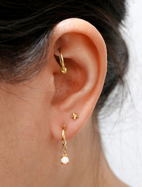 opal charm hoop stud earrings modelled