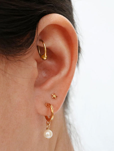 pearl charm hoop earrings modelled