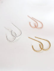 sterling silver, rose gold vermeil and yellow gold vermeil twisted hoop earrings