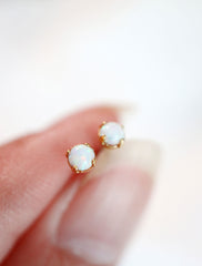 micro opal stud earrings close up
