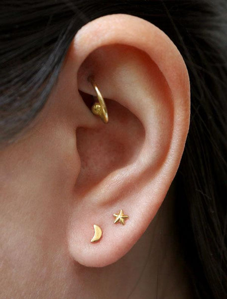 tiny gold vermeil moon studs modelled