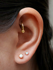 3mm and 4mm opal gold filled earrings modelled
