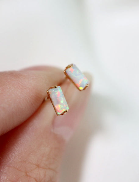 tiny opal baguette earrings close up