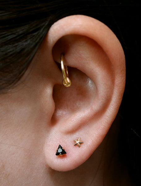 tiny black triangle studs modelled