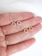 open hexagon earrings in hand