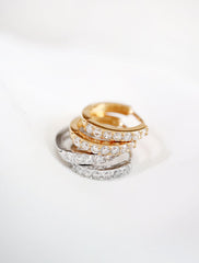 pave huggie hoop earrings in gold and silver