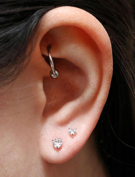 tiny crystal heart stud earrings modelled
