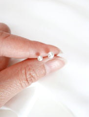 3mm & 4mm pearl earrings in hand