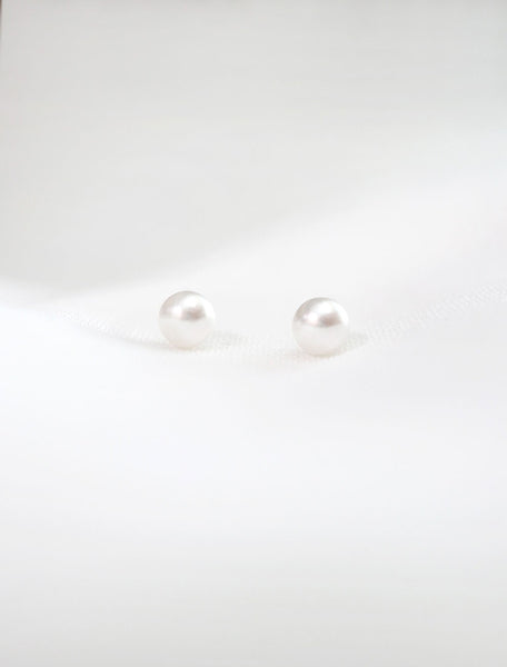 tiny white freshwater pearl studs