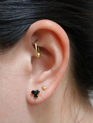 black crystal trefoil stud earrings modelled