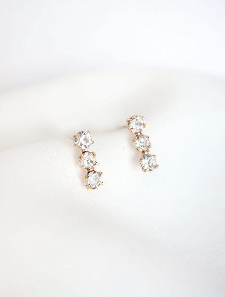 crystal triple bar stud earrings close up