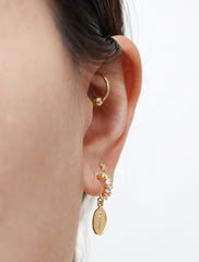 pave virgin mary hoop earrings modelled side view