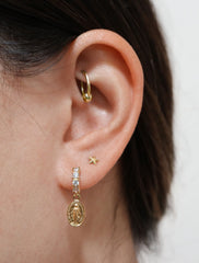 pave virgin mary hoop earrings modelled