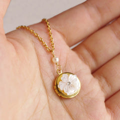 hibiscus . locket necklace