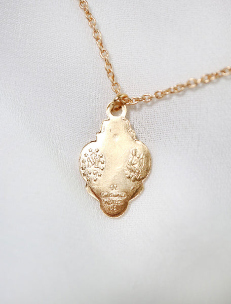 back of gold filled 3 way Catholic medal necklace