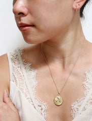 guardian angel medal necklace modelled