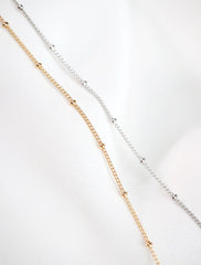 gold and silver satellite chain