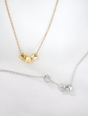 gold and silver cubix necklaces