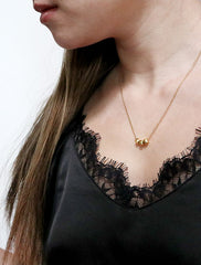 gold cubix necklace modelled