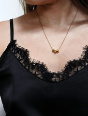 gold cubix necklace modelled