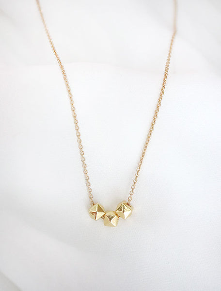 gold cubix necklace