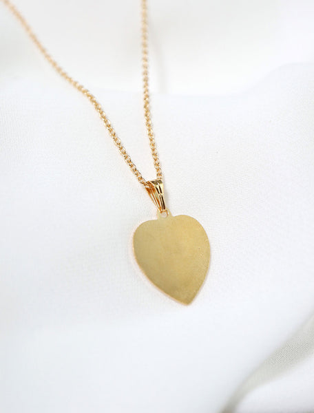 flaming heart pendant back
