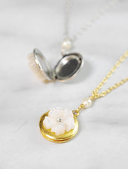 hibiscus . locket necklace