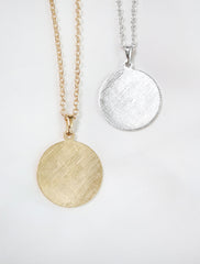 back of large horoscope necklace pendant