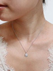 tiny horoscope necklace modelled